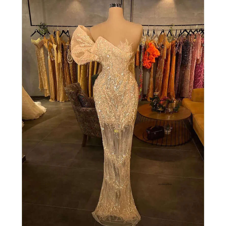 Sparkly Mrmaid Prom Drsss Slss U On Shouldr Appliqus Squins Or Lngth Clbrity Hollow Bad Evning Drss Bridal Gowns Plus Siz Custom 0431