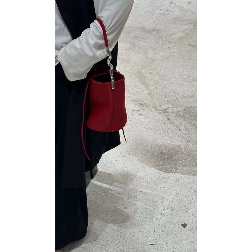 Simple Elegant Irregular Metal Strip Paired With Cowhide Women's Shoulder Bag Underarm Mini Handbag Bucket Purse Hobos