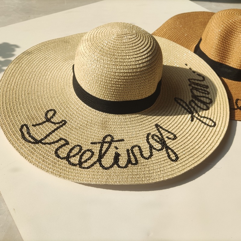 Hot selg elegant temperament letter printing beach sun shading women's large brimmed straw hat