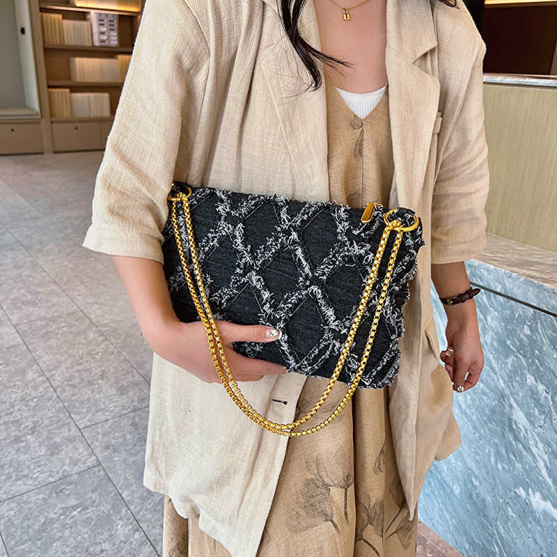 CMM Denim Bag Fashion Tassel Personality Womens Large Capacity Single Shoulder Chain Envelope Bag Trend