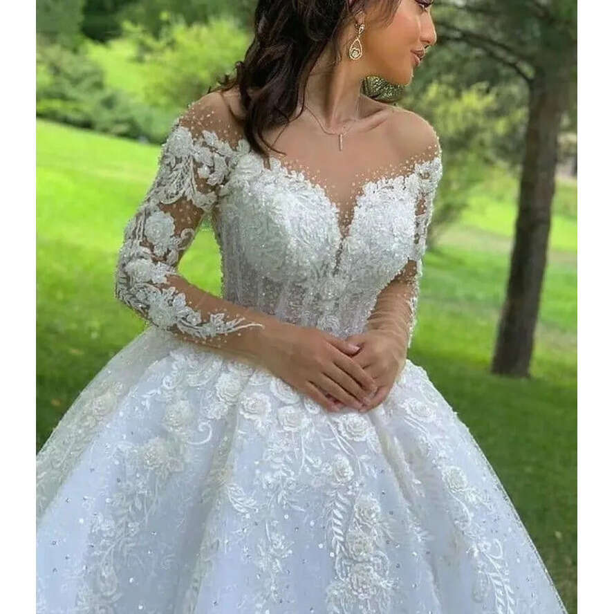 2024 A E Wedding Dresses Jewel Neck Long Sleeves Lace Appliques Crystal Beads Illusion 3D Ral Wers Sequins Sweep Train Sexy Bridal Gowns 0513