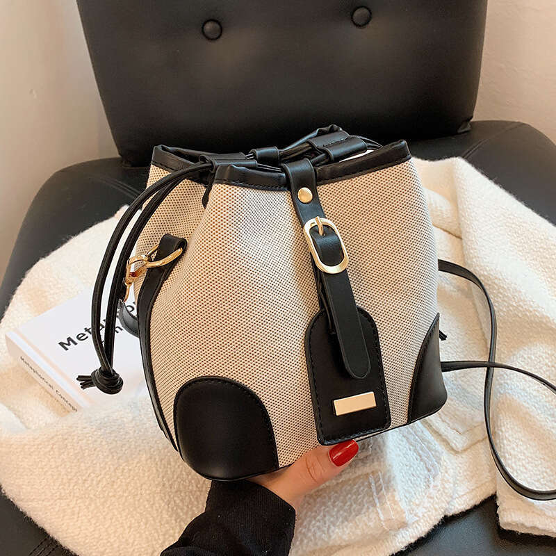 High end canvas contrasting color crossbody bucket for women's spring and summer 2024 new trend, niche design, versatile shoulder bag