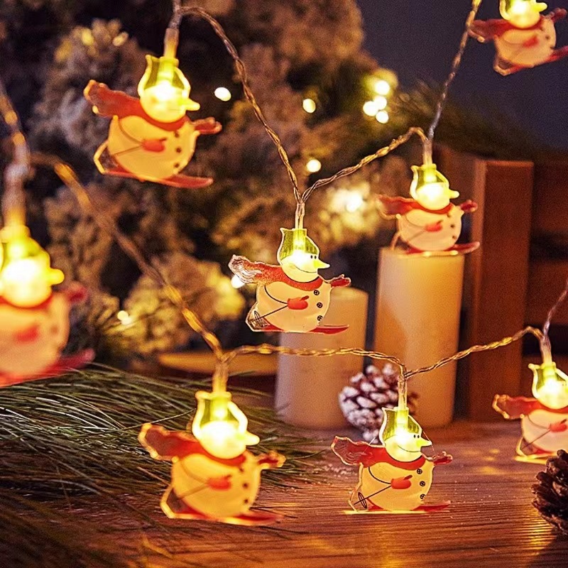 Snowman sled LED Christmas lights flashing lights strings of Christmas Day cartoon characters snowman scene atmosphere decorative lights
