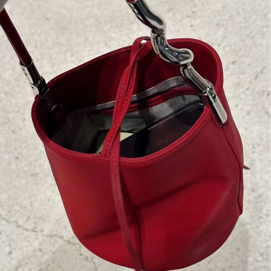Simple Elegant Irregular Metal Strip Paired With Cowhide Women's Shoulder Bag Underarm Mini Handbag Bucket Purse Hobos