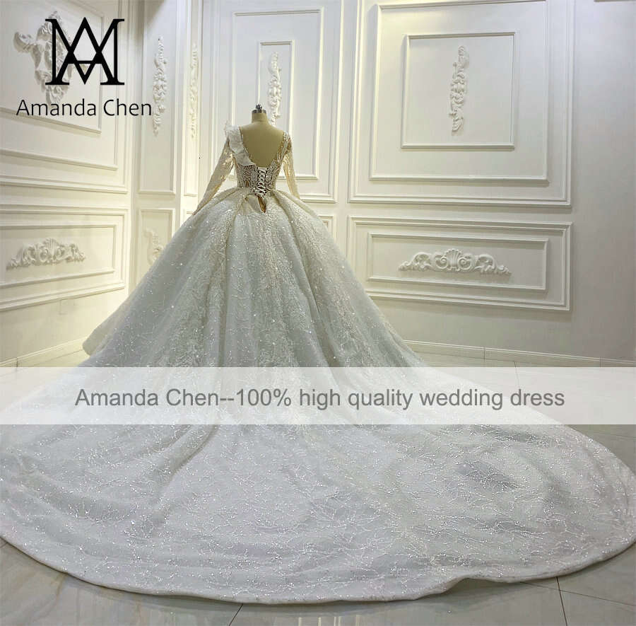 New Design Long Sleeve Lace Appliqued See Through Wedding Dress