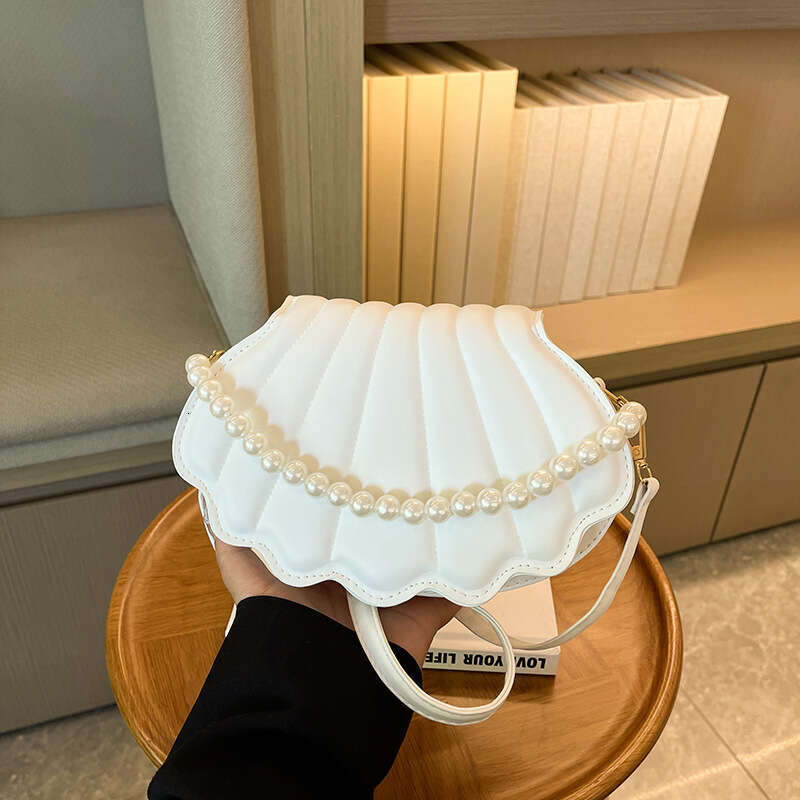 Bags shell niche design women's new fashionable shoulder this year popular pearl chain crossbody bag