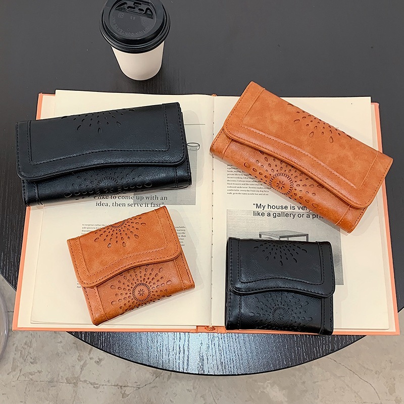 New designer oil wax PU handheld fashionable hollowed out women's mid to long money bag