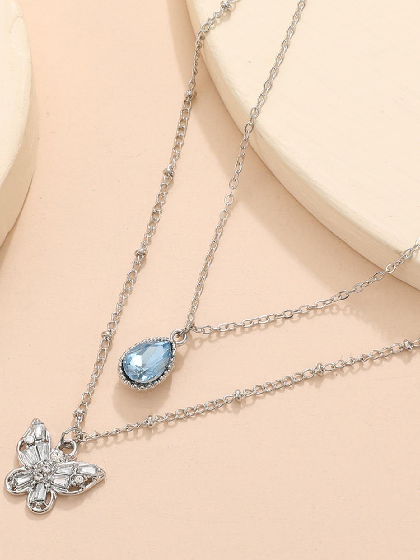 Elegant Multi-Layered Blue Zircon Droplet Butterfly Pendant Necklace for Shoulder Length Wear