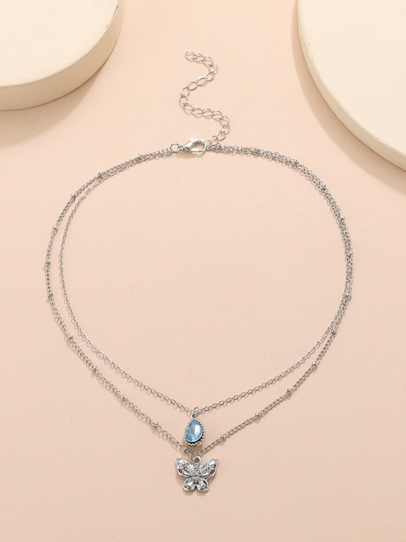 Elegant Multi-Layered Blue Zircon Droplet Butterfly Pendant Necklace for Shoulder Length Wear