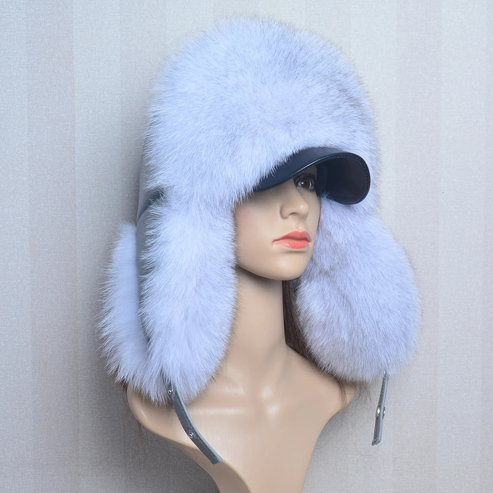 A genuine silver fox fur hat with ear flaps a genuine natural fur hat suitable for Russian womens bomber hats and a trap hat with a genuine leather to