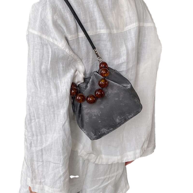 Chinese Beaded Hand-Held Small Female 2024 New Niche National Wind Shell One Shoulder Underarm Bag