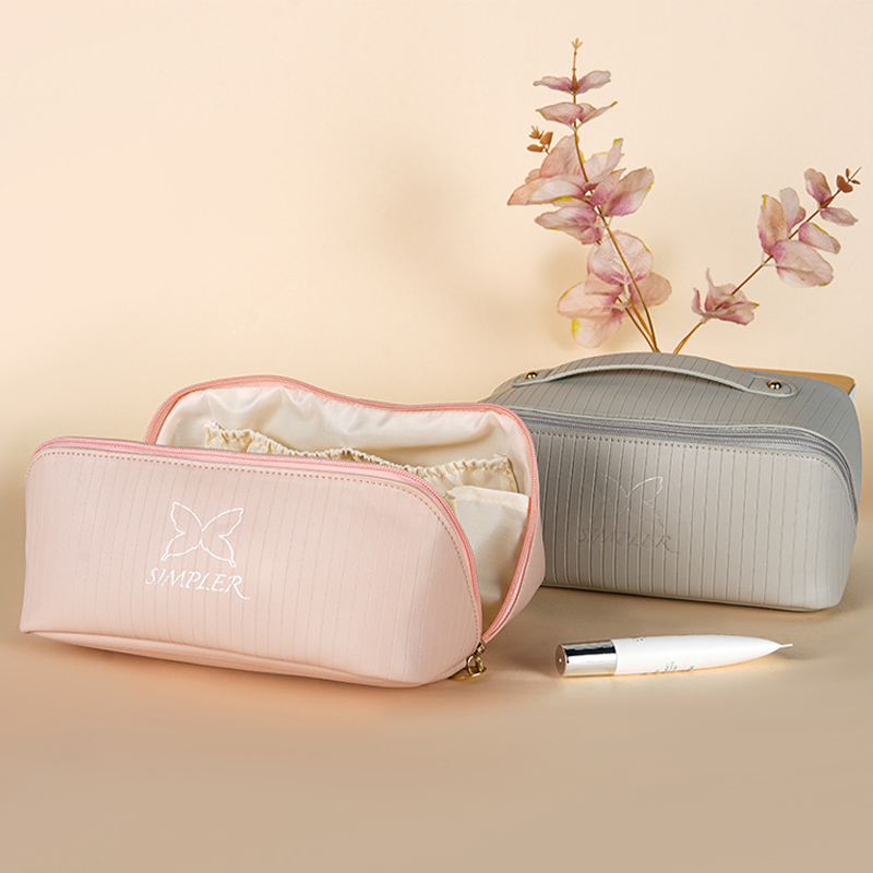Tote bag new vertical stripes storage cosmetic bag large capacity senior sense of cute face value travel portable