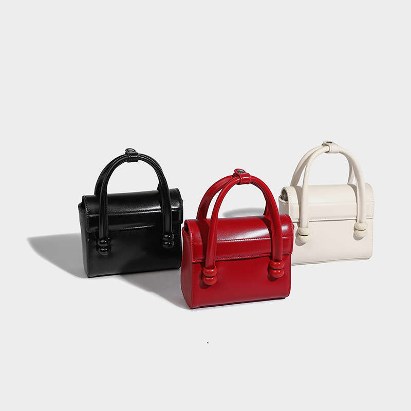 New 2024 Mini-Niche Design Portable High-Grade Casual Simple Shoulder Slung Mobile Phone Bag.