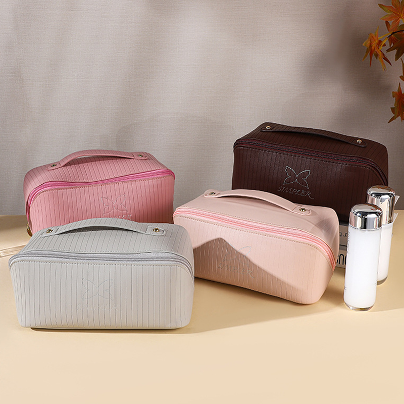 Tote bag new vertical stripes storage cosmetic bag large capacity senior sense of cute face value travel portable