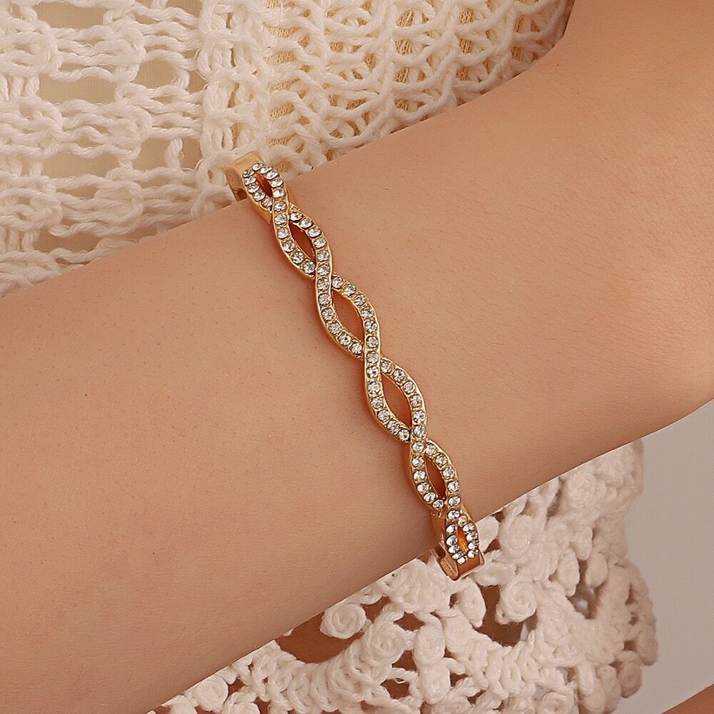 Chic Hollow Design Bracelet Featuring Intricate Cross Stitching & Diamond Detailing