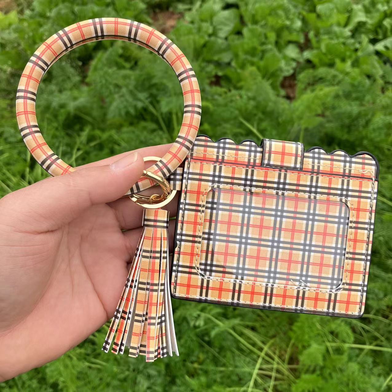 New designer leopard print PU leather tassel bracelet keychain women's card changing handbag ID bag
