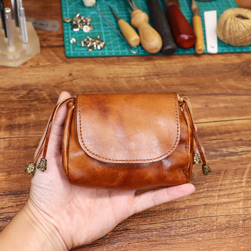 New designer handmade color wiping plant tanning coin purse suitable for women's Chinese style top leather key headphone storage bag