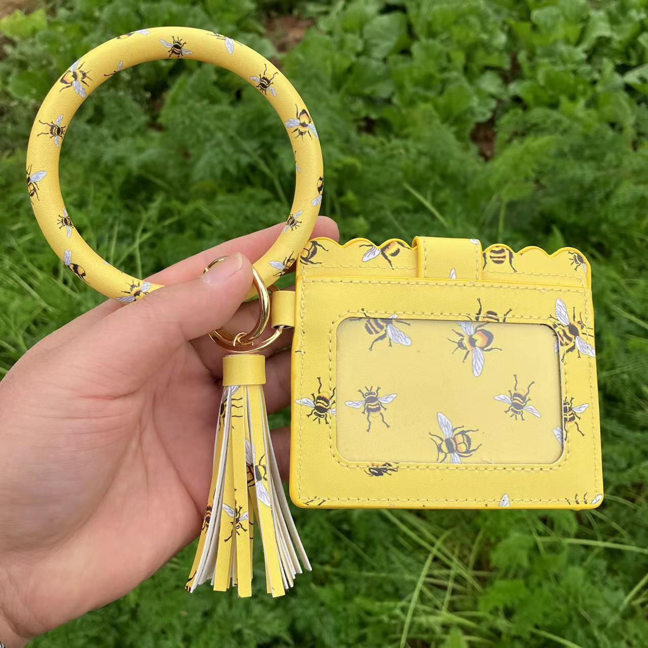 New designer leopard print PU leather tassel bracelet keychain women's card changing handbag ID bag