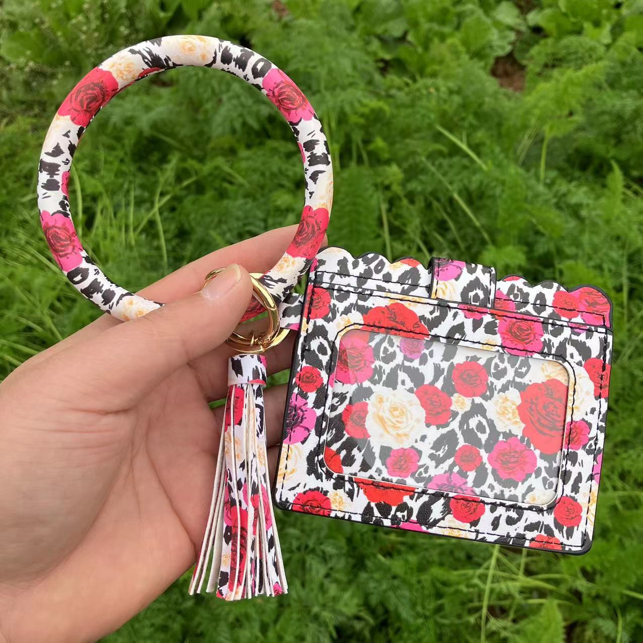 New designer leopard print PU leather tassel bracelet keychain women's card changing handbag ID bag