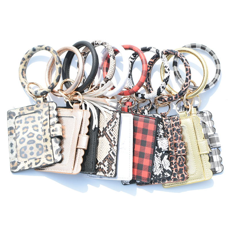 New designer leopard print PU leather tassel bracelet keychain women's card changing handbag ID bag