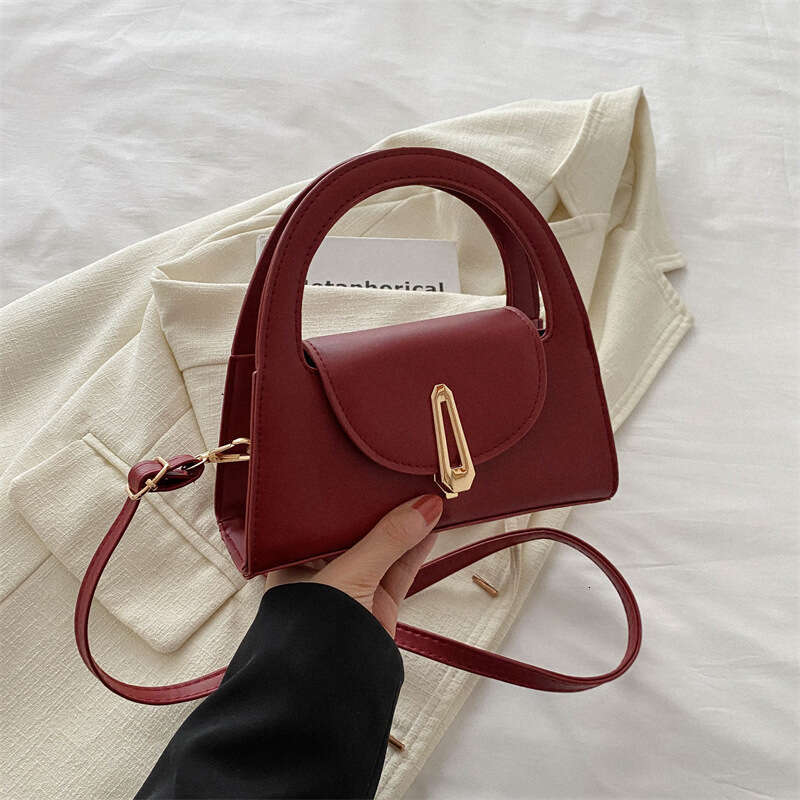 2024 Summer New Half-Round Solid Color Commuter Lock Bag For Women: Trendy & Stylish Casual Crossbody Option