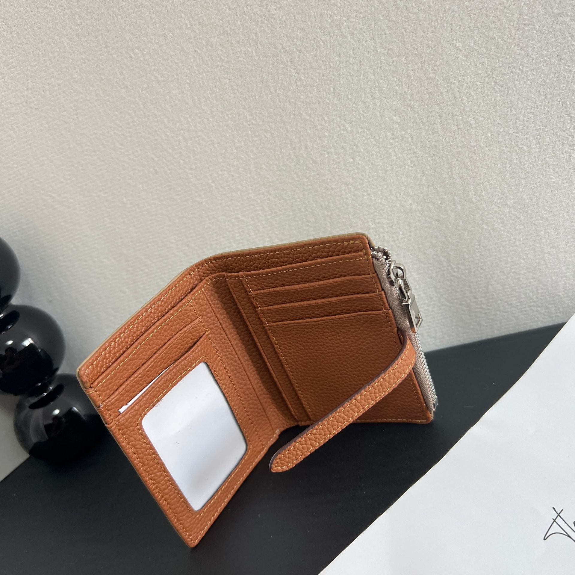 First layer cowhide double fold short wallet with women's drawstring design, contrasting and color blocking zipper wallet, folded coin purse
