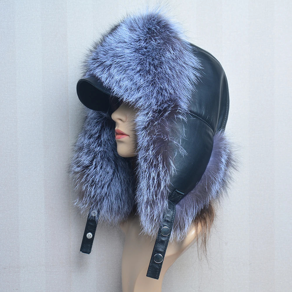 A genuine silver fox fur hat with ear flaps a genuine natural fur hat suitable for Russian womens bomber hats and a trap hat with a genuine leather to