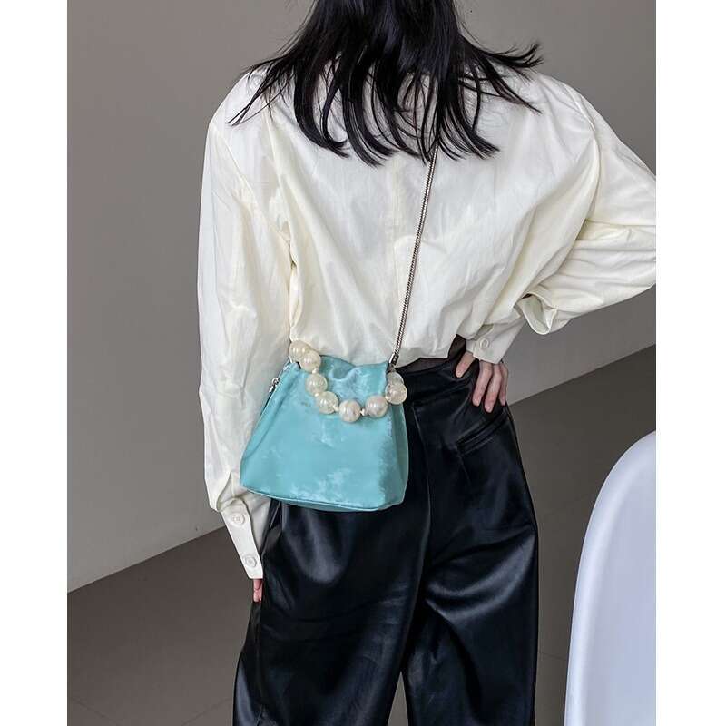 Chinese Beaded Hand-Held Small Female 2024 New Niche National Wind Shell One Shoulder Underarm Bag