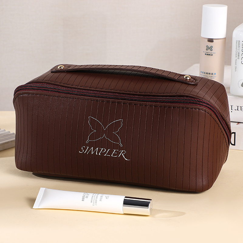 Tote bag new vertical stripes storage cosmetic bag large capacity senior sense of cute face value travel portable