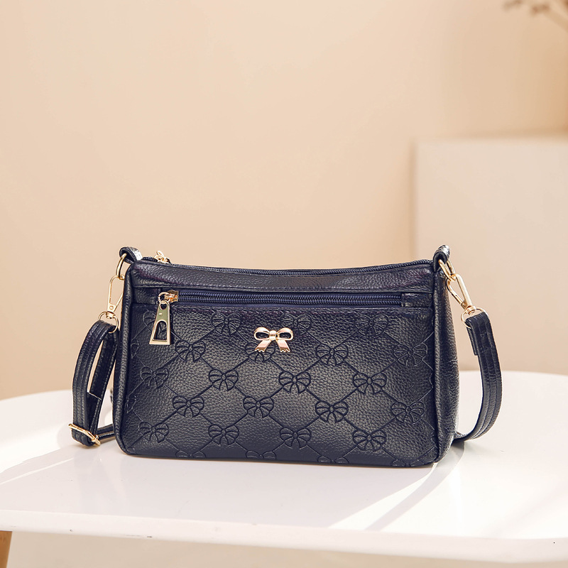 Yongxing White Horse Leather Korean Edition Fashion Women's Single Cross Shoulder Small Mom Leisure Bag