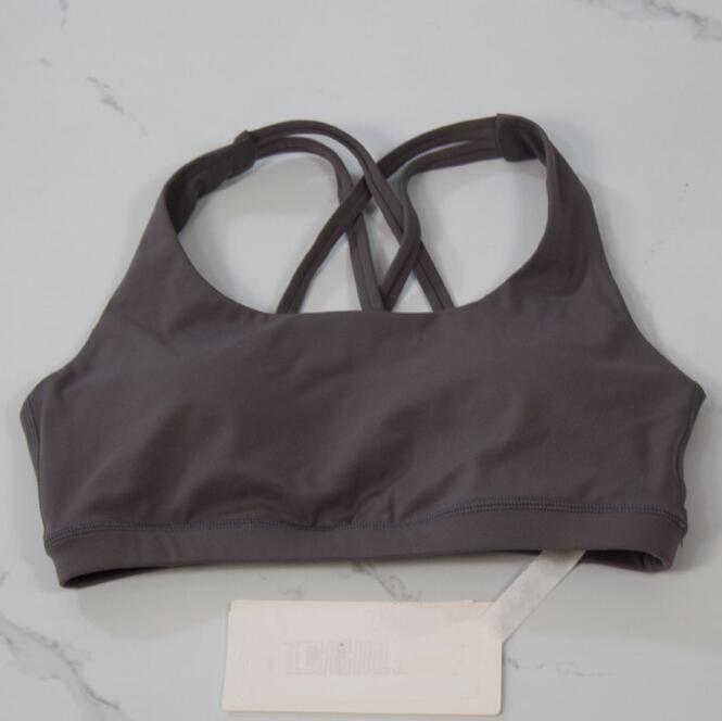 2025 Yoga Fashion designer yoga clothes energy women sports underwear cross bra sexy silicone cotton pad