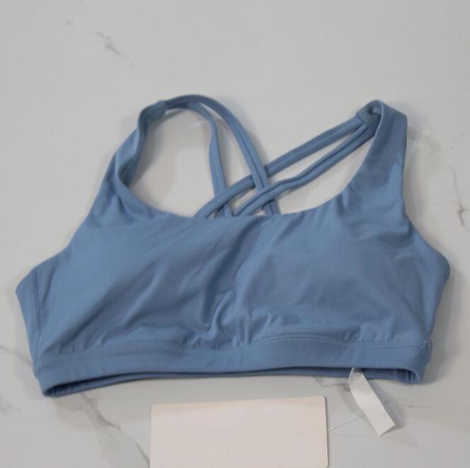 2025 Yoga Fashion designer yoga clothes energy women sports underwear cross bra sexy silicone cotton pad