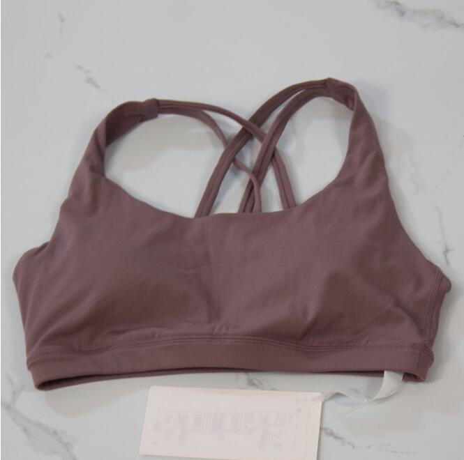 2025 Yoga Fashion designer yoga clothes energy women sports underwear cross bra sexy silicone cotton pad
