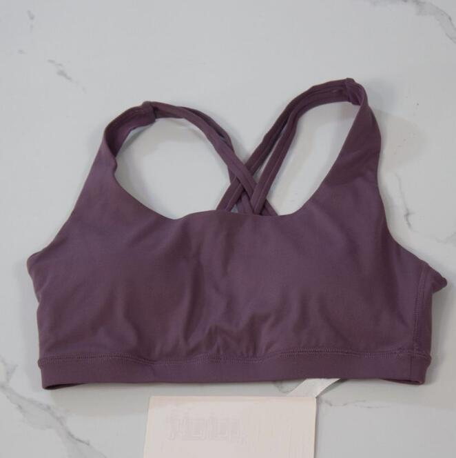 2025 Yoga Fashion designer yoga clothes energy women sports underwear cross bra sexy silicone cotton pad