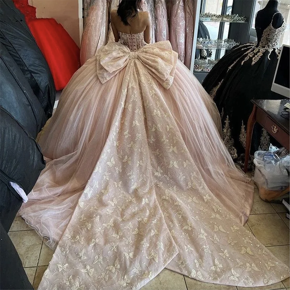 2023 Light Pink Quinceanera Dresses Handmade Butterfliers Applique Beaded Bow Sweep Train Tulle Custom Made Sweet 15 16 Princess Pageant Ball Gown ves