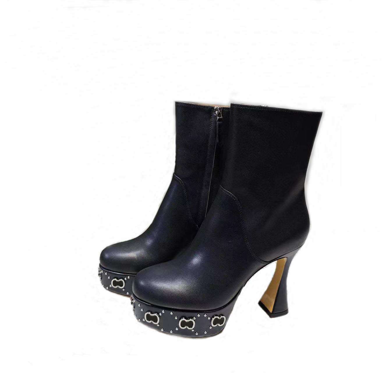 Fashionable womenswear designer Rois Boots Ankle Martin Boots and Nylon Boot military inspired combat cloth bag attached to the in black
