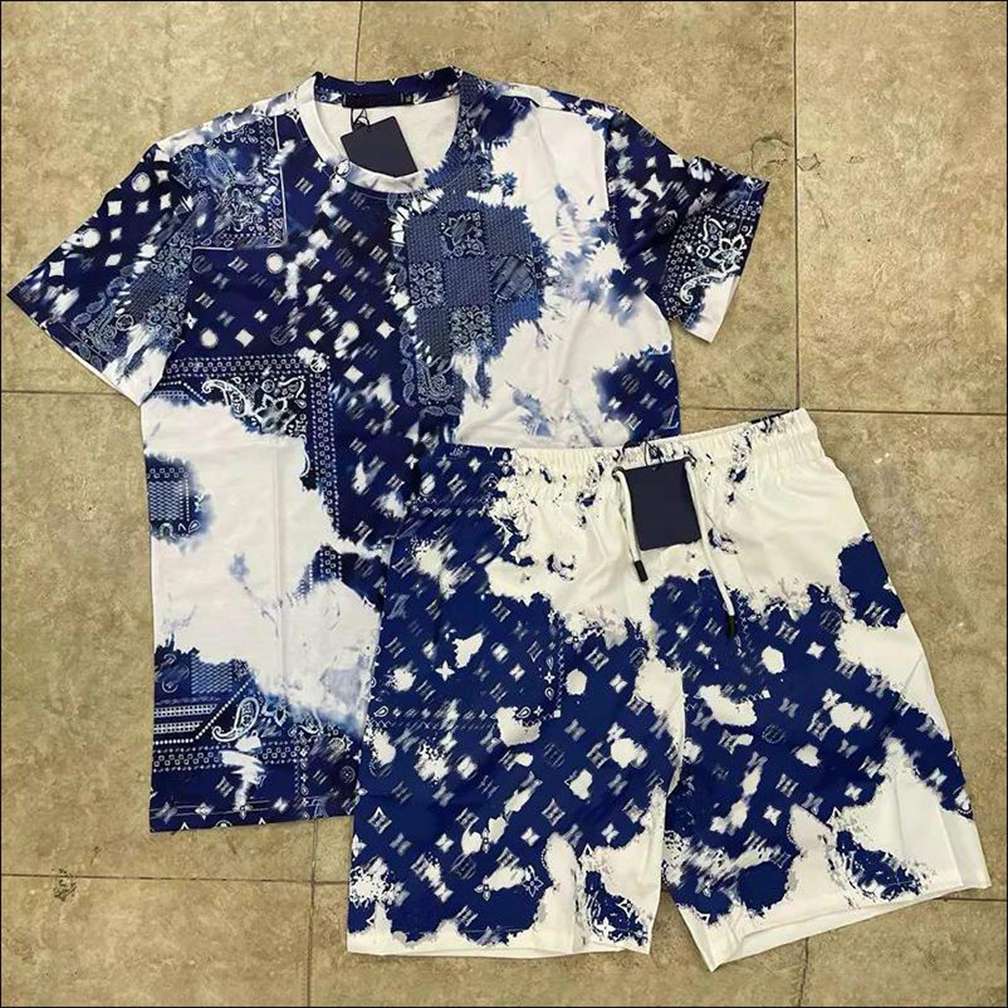 Mens Tracksuit Designer Sweat Track Suit Casual Pure Hand-Knitted Hollowed Out Short-Sleeved Shirt And Leather Suit Shorts Suit Holiday polo clothes