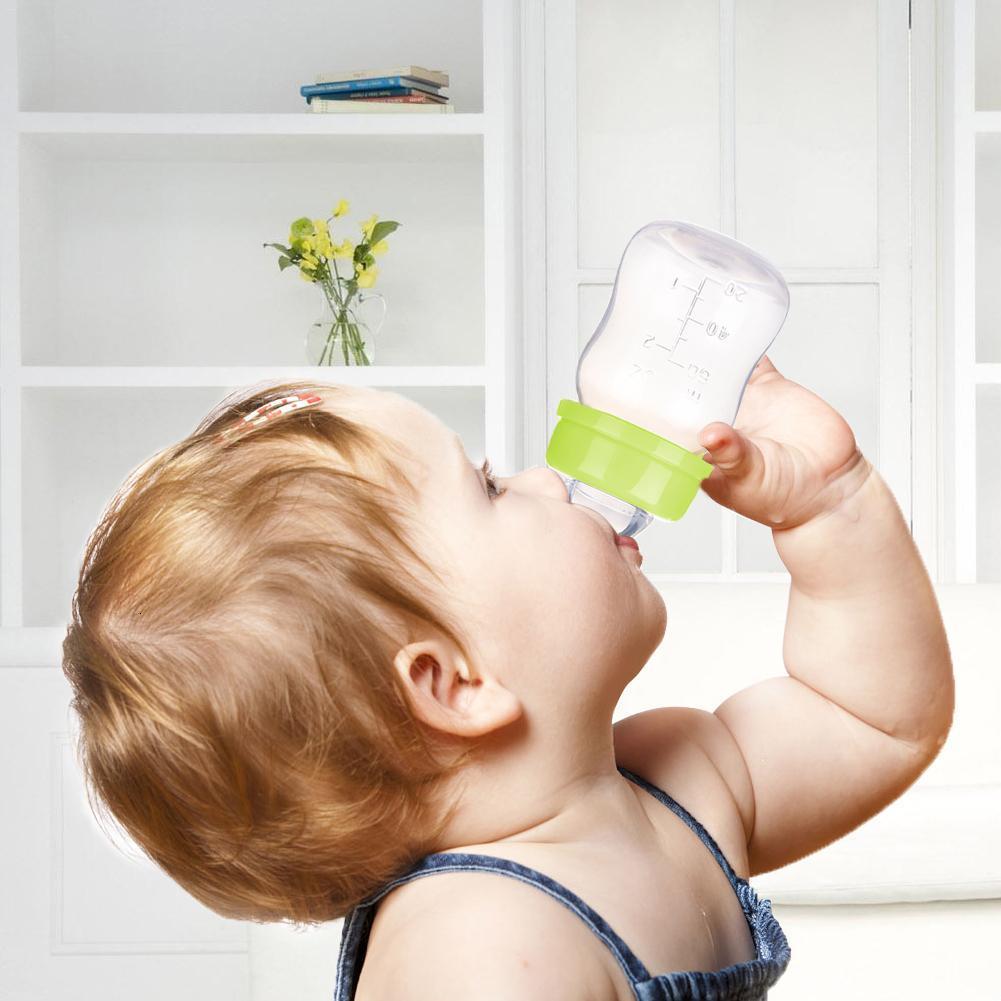 Baby Bottles# Infant Mini Portable Feeding Nursing Bottle BPA Free Safe born Kids Care Feeder Fruit Juice Milk Bottles 60ML 230914