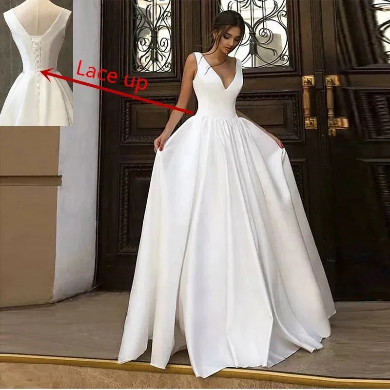 Sexy Beach Wedding Dresses Lace 2024 Sleeveless Pearls Appliques Backless Champagne Bride Dress Bridal Gown Robe De Mariee 01