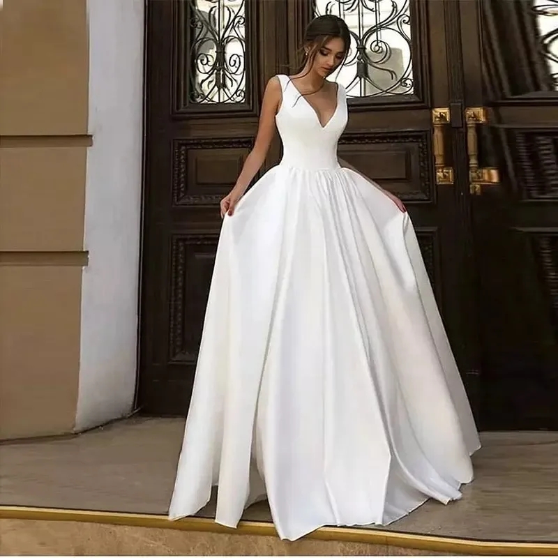 Sexy Beach Wedding Dresses Lace 2024 Sleeveless Pearls Appliques Backless Champagne Bride Dress Bridal Gown Robe De Mariee 01