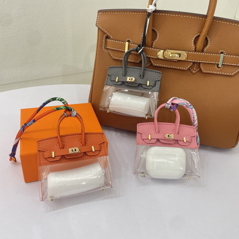 Other Fashion Accessories Netizen Girls Car Key Bag Mini Platinum Pendant Exquisite and High Grade Earphone Mouth Red 230921