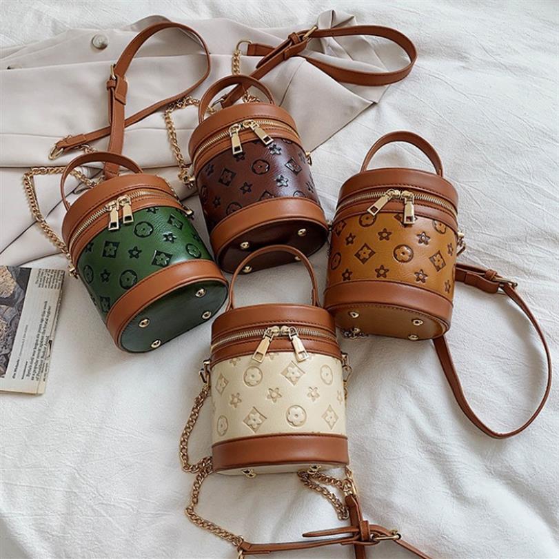 Summer Cylinder Female Bag 2021 Trendy Korean Version Wild Messenger Bags Celebrity Party Design Mini Portable Small Handbag Embos164P, Brown
Summer Cylinder Female Bag 2021 Trendy Korean Version Wild Messenger Bags Celebrity Party Design Mini Portable Small Handbag Embos164P, Brown