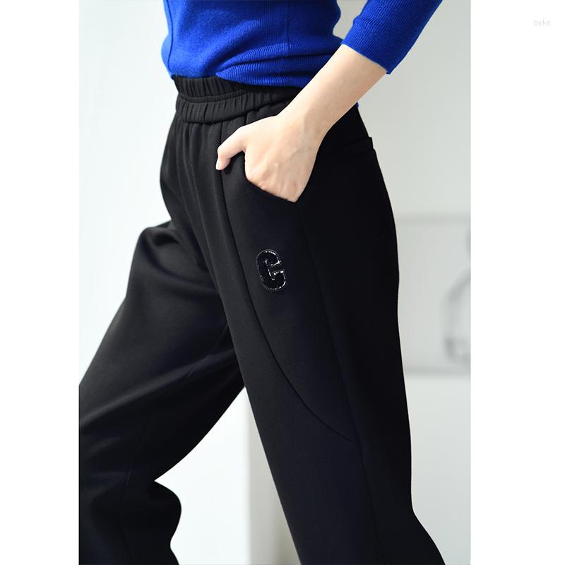 Women's Pants MICOCO K5920C Korean Casual Flocking Alphabet Embroidery Loose And Slim Elastic High Waist Radish Trousers, Black
Women's Pants MICOCO K5920C Korean Casual Flocking Alphabet Embroidery Loose And Slim Elastic High Waist Radish Trousers, Black