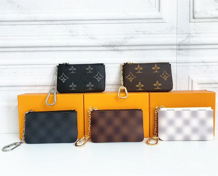 M62650 With box coin purses Leather Holders Purse wallets luxury Designer classic Womens Mens Key Ring Card Holder Mini Wallet 7A quality chain with clasp CardHolder, 1-damire ebene
M62650 With box coin purses Leather Holders Purse wallets luxury Designer classic Womens Mens Key Ring Card Holder Mini Wallet 7A quality chain with clasp CardHolder, 1-damire ebene