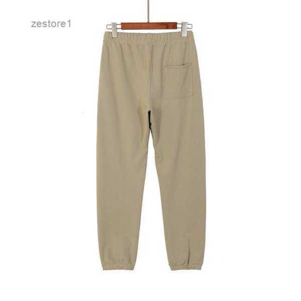 Spring Mens Reflective Ess Pants Silocone Letters Print Essential Trousers Casual Designer Sweatpants Men Women Fog Jogger Feel of God Qmcl
Spring Mens Reflective Ess Pants Silocone Letters Print Essential Trousers Casual Designer Sweatpants Men Women Fog Jogger Feel of God Qmcl