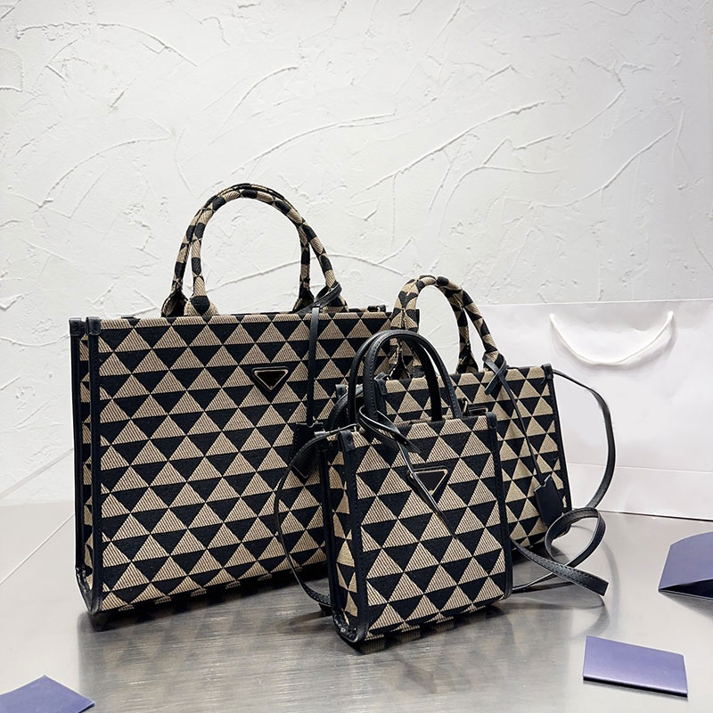 Large Tote Shopping Bag Eembroidered Fabric Handbag Triangle Sign Shoulder Bags Geometric Design Removable Leather Keychain Inside Nylon Lining Zipper Pockets
Large Tote Shopping Bag Eembroidered Fabric Handbag Triangle Sign Shoulder Bags Geometric Design Removable Leather Keychain Inside Nylon Lining Zipper Pockets