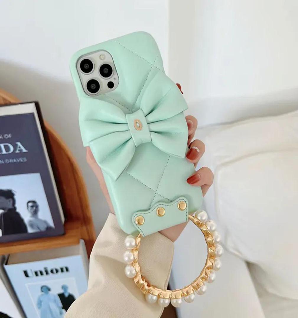 Luxurys Desingers iphone Cases Fashion 13 Mobile Phone Case 12117 with Bow Stereo Camera portemonnaie 12pro Fashion and Generou1047577, Black
Luxurys Desingers iphone Cases Fashion 13 Mobile Phone Case 12117 with Bow Stereo Camera portemonnaie 12pro Fashion and Generou1047577, Black