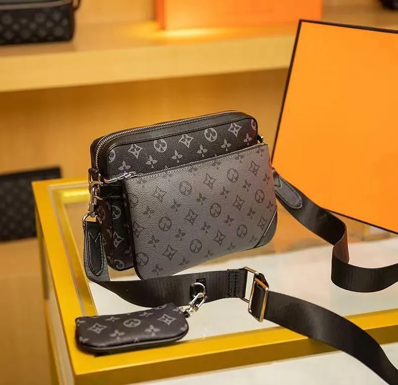 Handbags Men Leather TRIO Messenger Bags Luxury Shoulder Bag Make up Bag Designer Handbag Tote Mans Fashion louiseitys LVS viutonitys, Customize
Handbags Men Leather TRIO Messenger Bags Luxury Shoulder Bag Make up Bag Designer Handbag Tote Mans Fashion louiseitys LVS viutonitys, Customize
