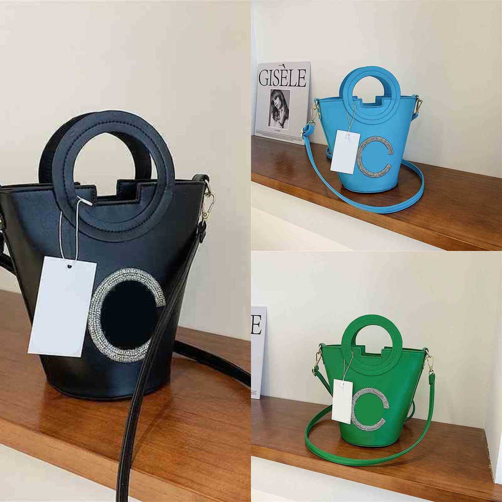 Women bucket Candy Color Portable Single Shoulder Bag Texture Bucket Inlaid Diamond Messenger Armpit with baseball hat 220611, Black12
Women bucket Candy Color Portable Single Shoulder Bag Texture Bucket Inlaid Diamond Messenger Armpit with baseball hat 220611, Black12