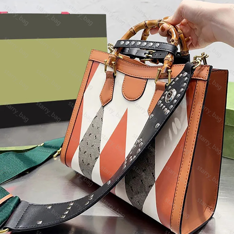 Bamboo Handbag Designer Tote Bags Women Crossbody Shoulder Bags Leather Letter Shopping Bag Wide Strap Rivet Gold Hardware Red Green Ribbon, G1
Bamboo Handbag Designer Tote Bags Women Crossbody Shoulder Bags Leather Letter Shopping Bag Wide Strap Rivet Gold Hardware Red Green Ribbon, G1
